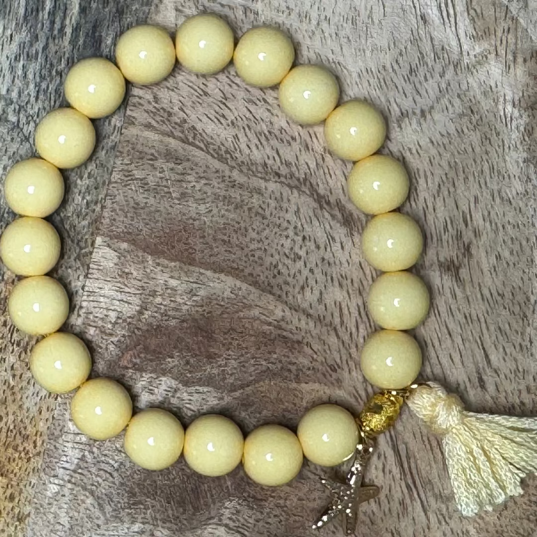 Zomer | Color Noice | Zachtgeel & Olijfgroen met kwastje en disc-kralen