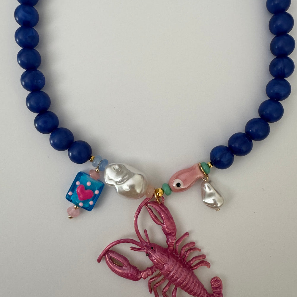 
                      
                        Ketting - Zomer - Parel en Kreeft | Ouroboros By Soraya
                      
                    